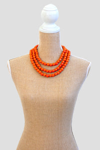 Orange 3 tiered wooden folk necklace